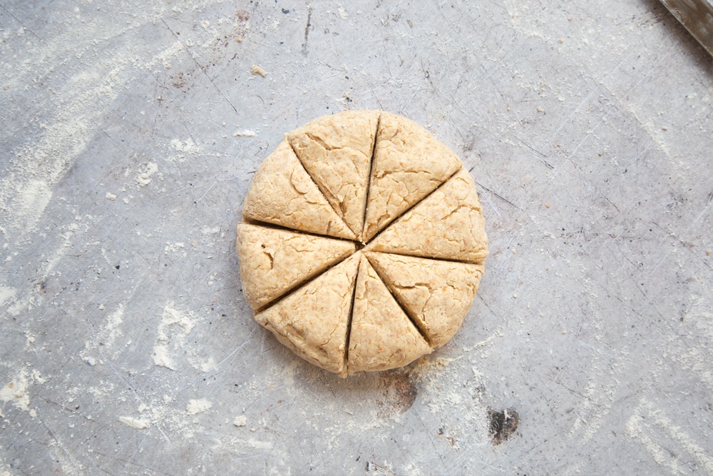 Scone dough cut into eight triangles