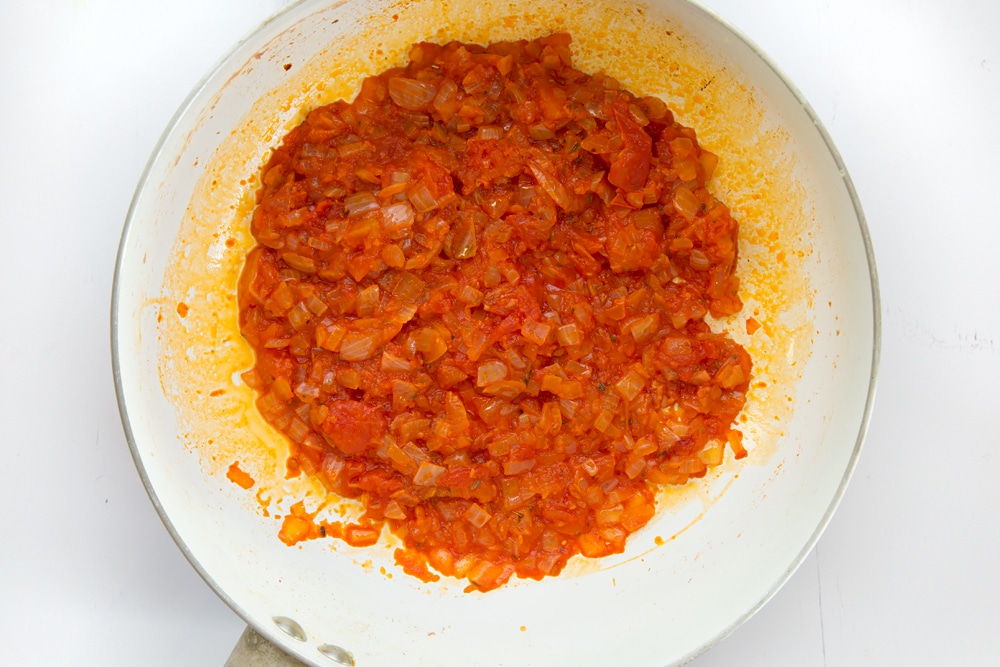 Overhead shot of tomato sauce mix in a pan