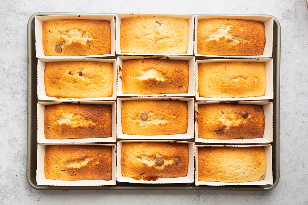Overhead shot of the chocolate chip mini-loaf cake with chocolate frosting having been baked in the oven for between 18 and 20 minutes.
