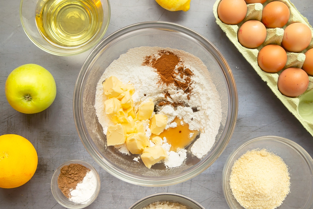 Preparing the spiced rum frosting for these Christmas pudding muffins