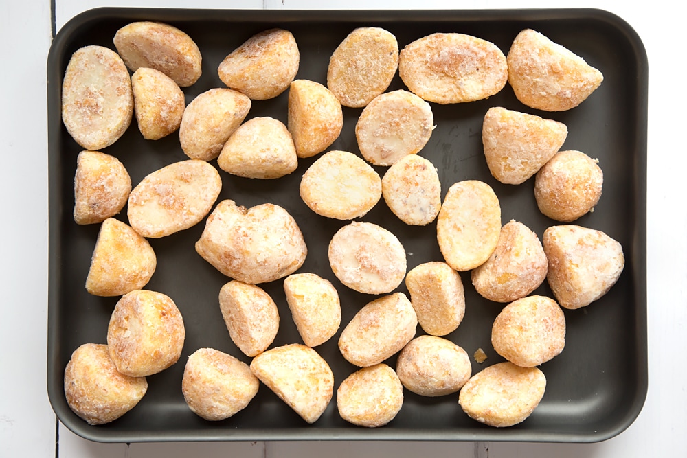 To start with how to make frozen roast potatoes taste better you're going to need frozen potatoes.