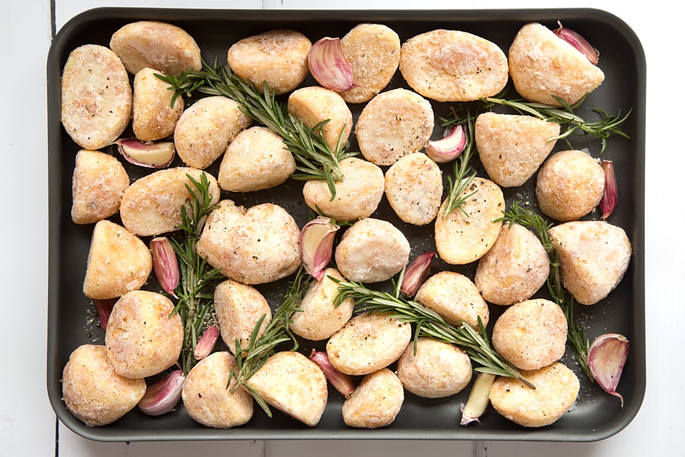 Start looking at how to make frozen roast potatoes taste better by adding rosemary leaves