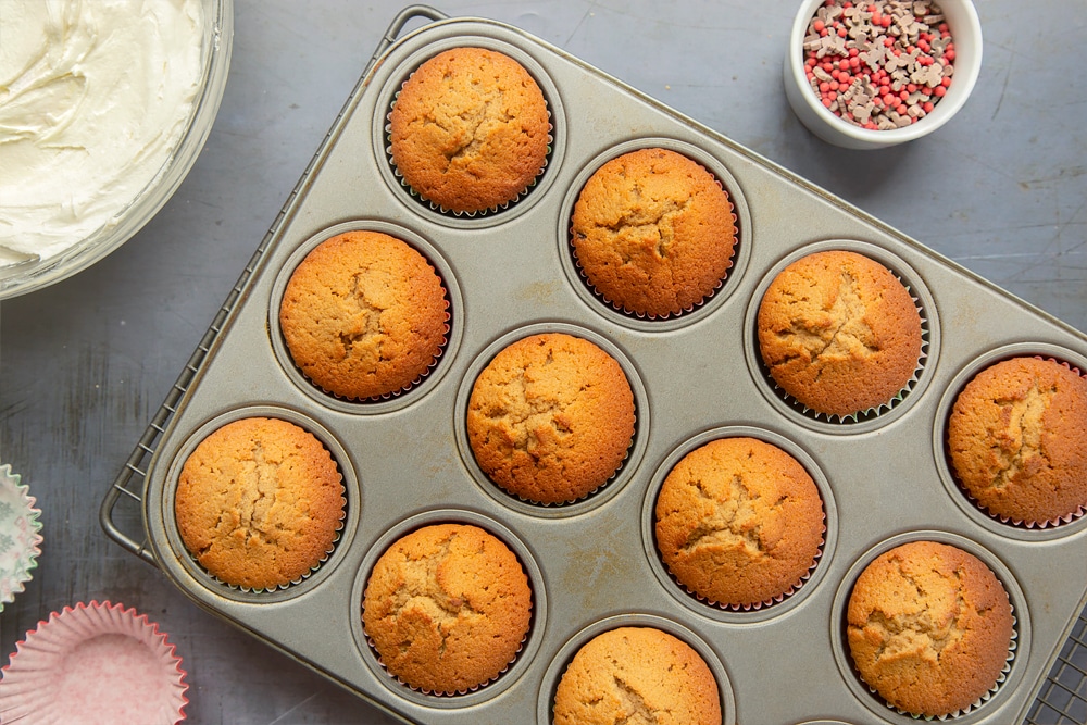 Overhead shot of the spiced Christmas cupcakes after being baked in the oven for 18 minutes.