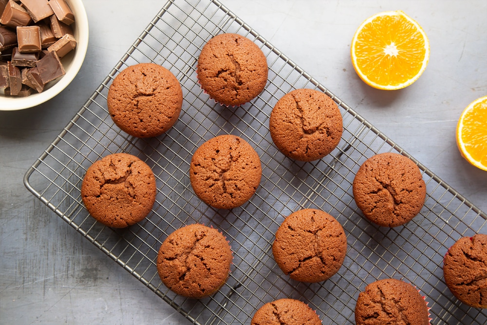 Jaffa cake cupcakes cooling on a wire rack