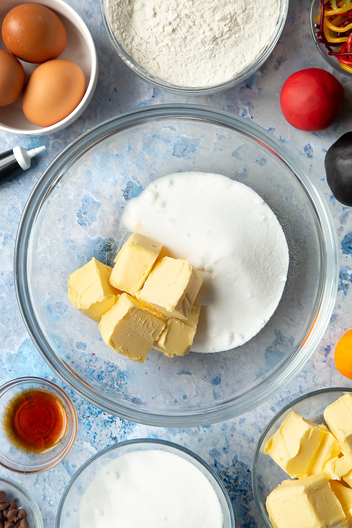 Butter and sugar being mixed in a bowl for the snowman cupcakes.