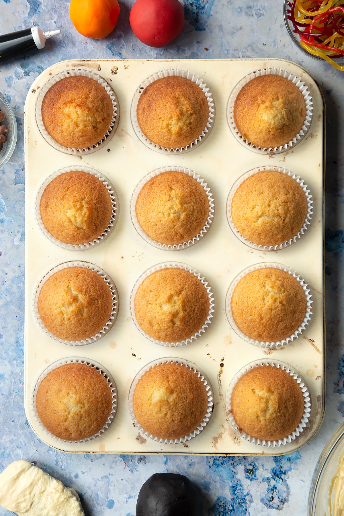 Overhead shot of the cupcake tray after spending 12 minutes in the oven.