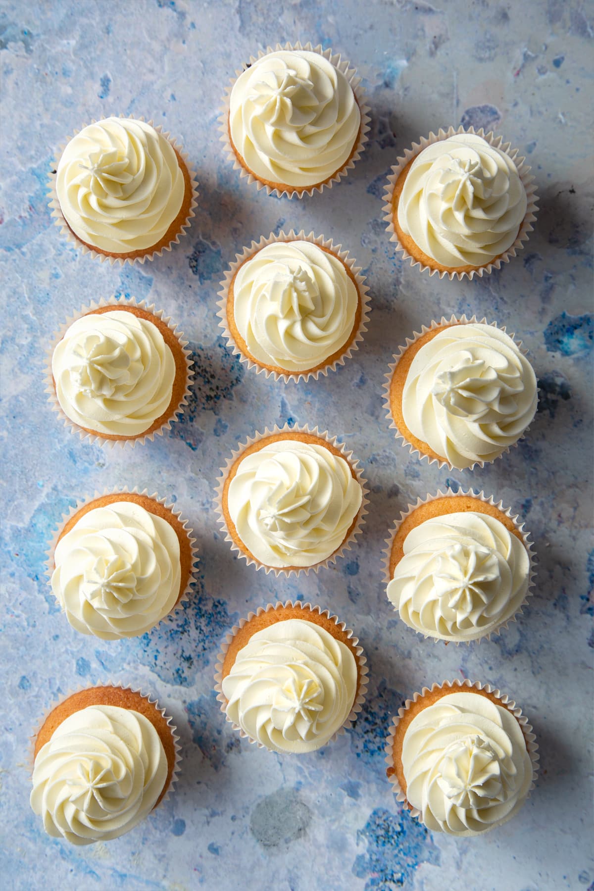 Overhead shot of the cupcakes after adding the frosting.