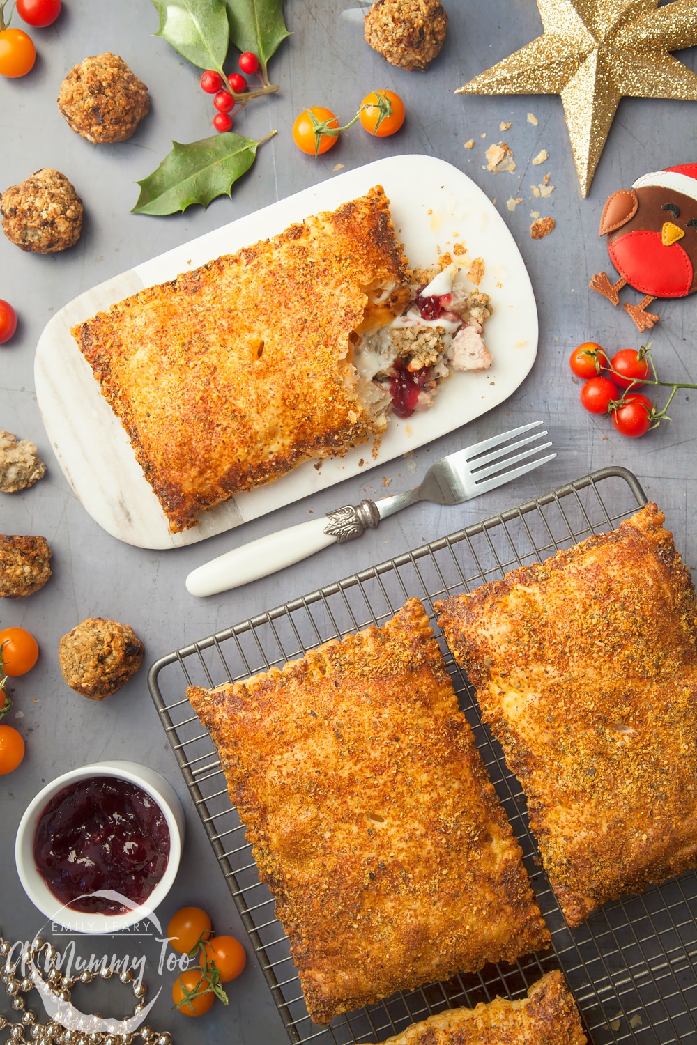A festive slice made with turkey, bacon and stuffing - shown served with stuffing balls and garnish