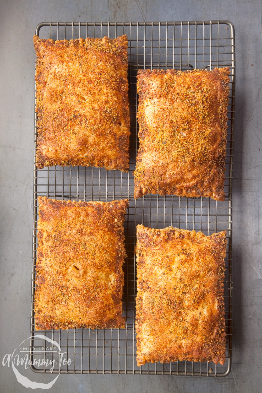 Festive slices having been baked in the oven until they are brown and golden cooling on a wire rack.