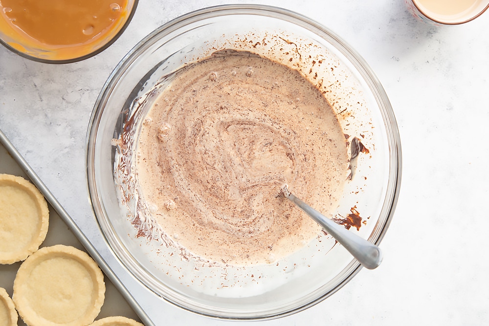 Whisking the chocolate, cream and Baileys mix