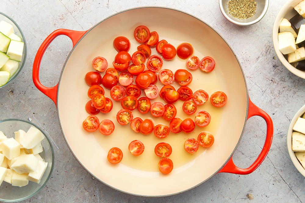 Frying cherry tomatoes in a pan
