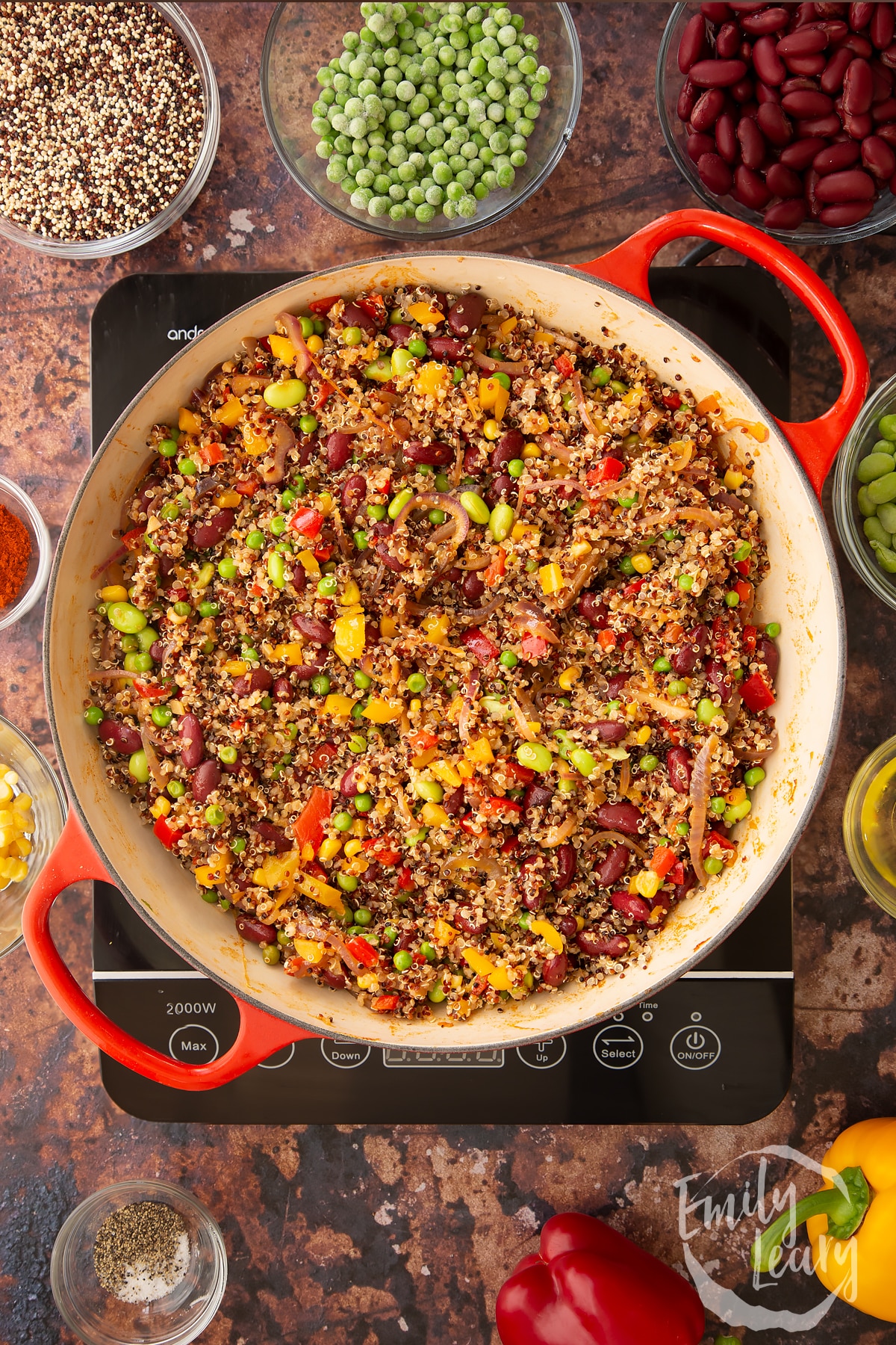 Overhead shot of some of the ingredients mixed together in a pan on the hob.