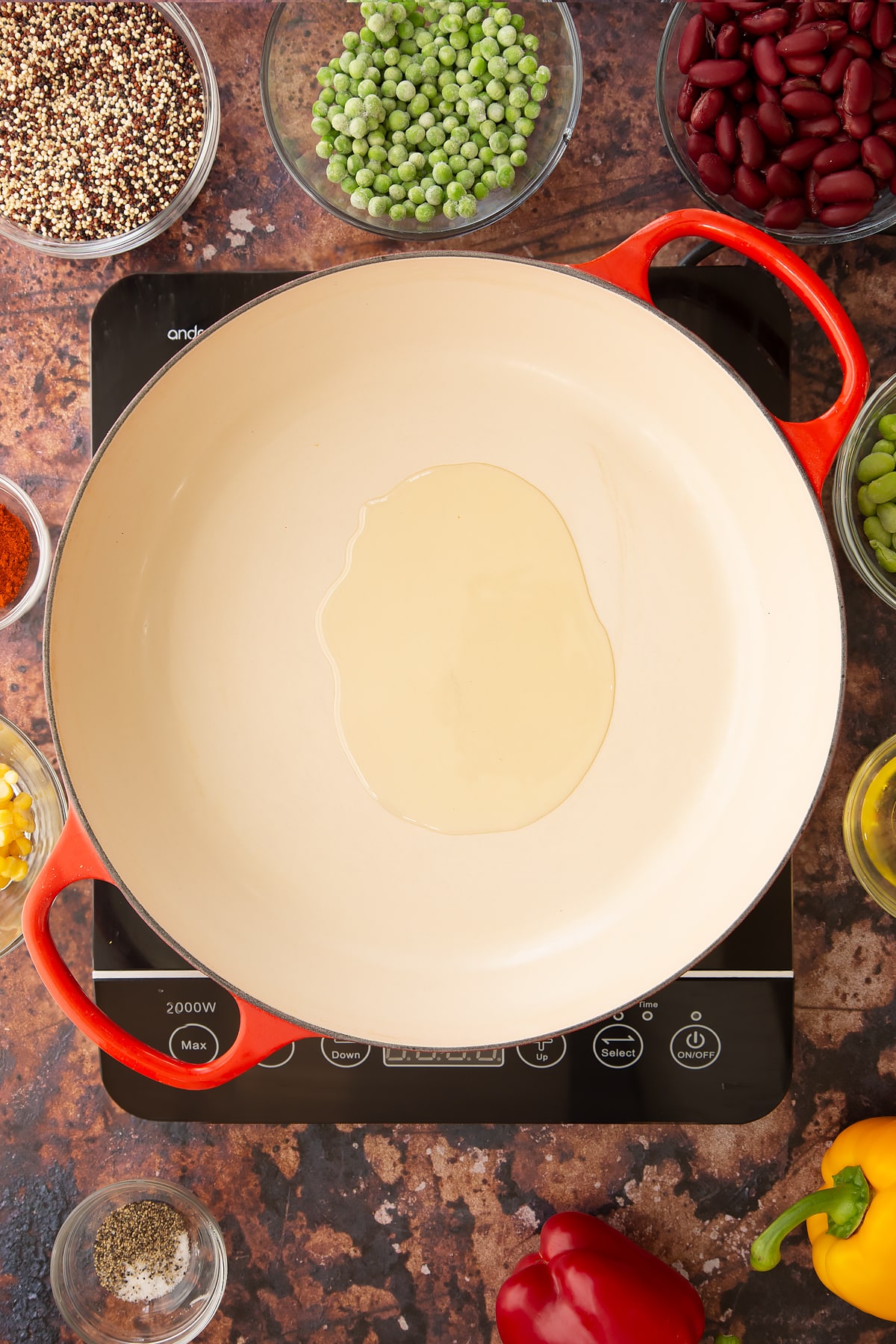 Overhead shot of some oil melting in a pan.