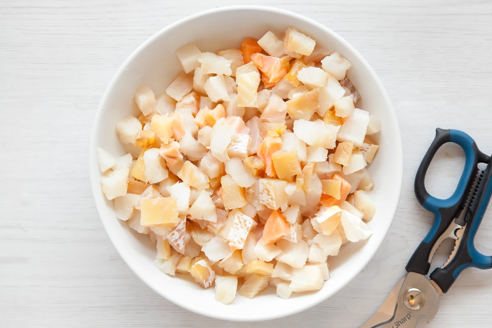 Prepare your fish pie mix for the mini cheesy fish pies