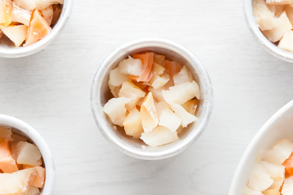 Fish pie mix in pie moulds