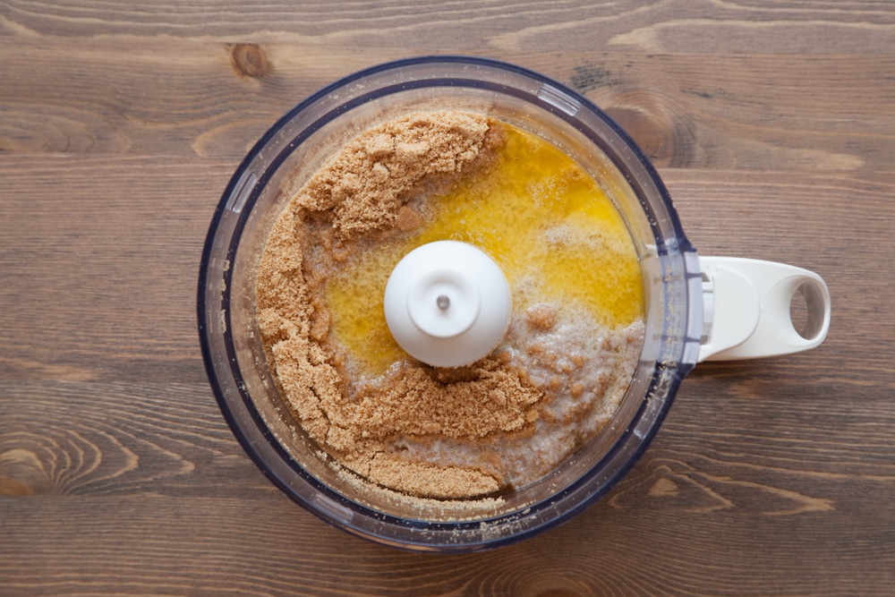 Digestive biscuits, blitzed to a crumb in a food processor topped with melted butter.