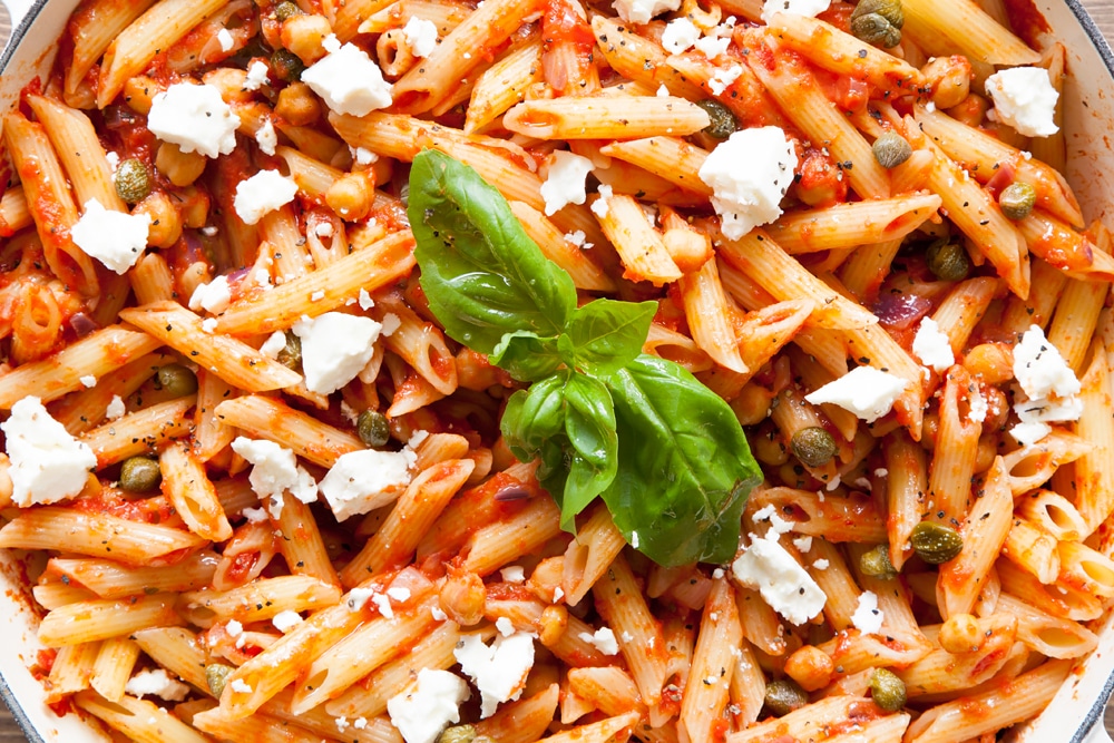 Top your zingy spring pasta with crumbled feta