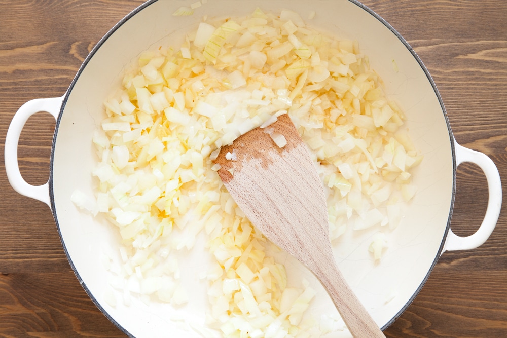Cooking onion and garlic in a frying pan