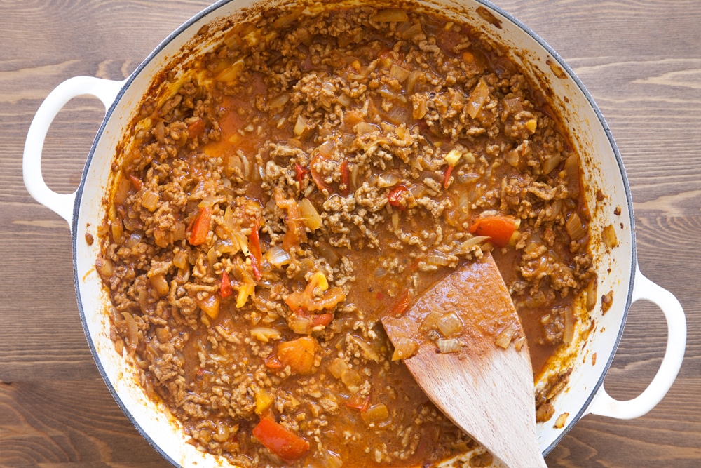Heating the lamb keema in a pan