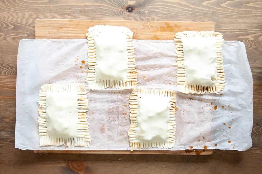 Preparing the apple and granola puff parcels for baking
