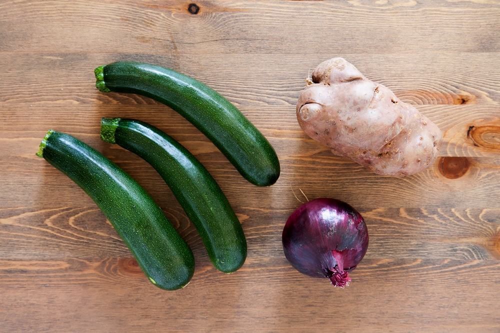 Courgettes, potatoes and red onion
