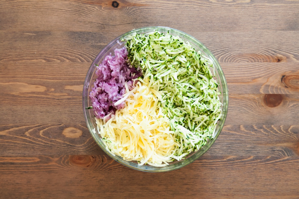 Grated courgette, potato and red onion