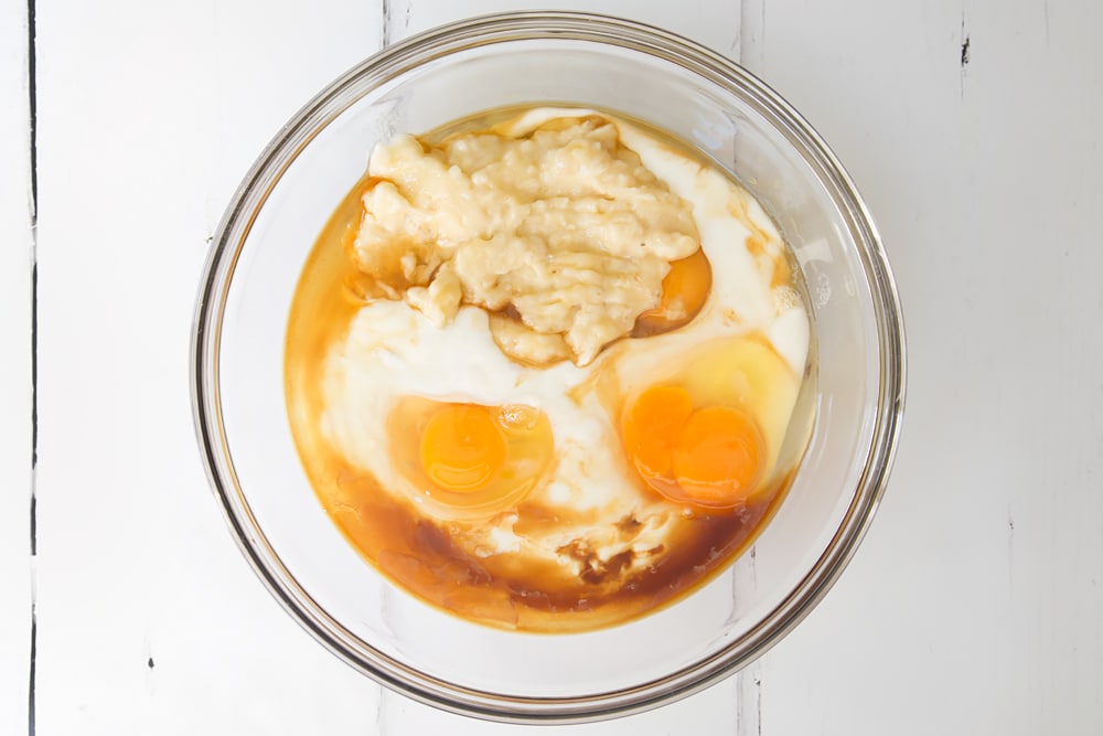 Mix your ingredients together in a bowl - the first step in baking these delicious, healthier breakfast treats