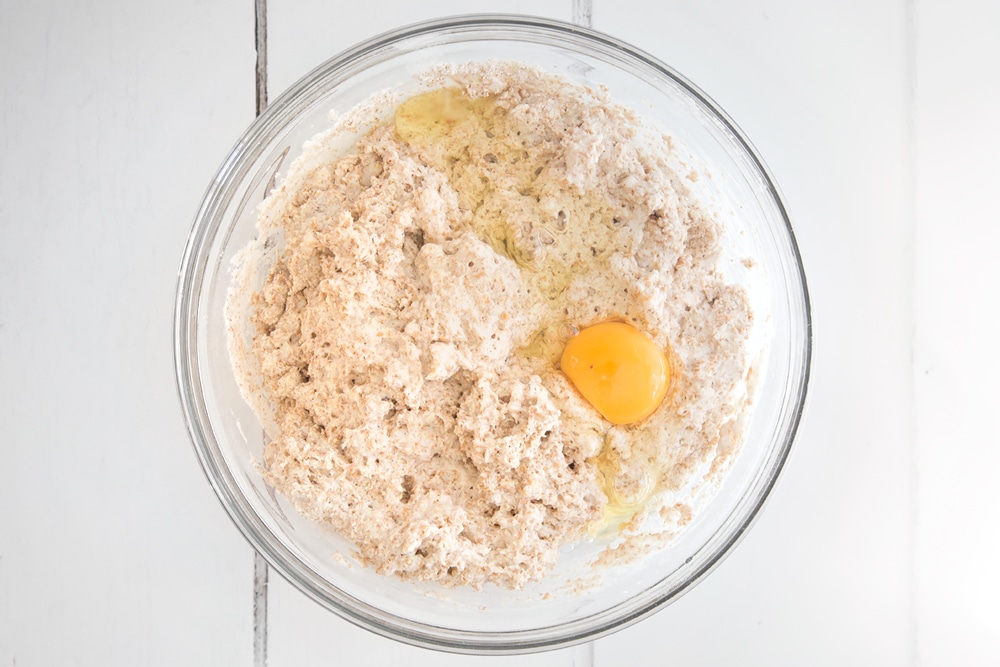 An egg is added to the ingredients and mixed well