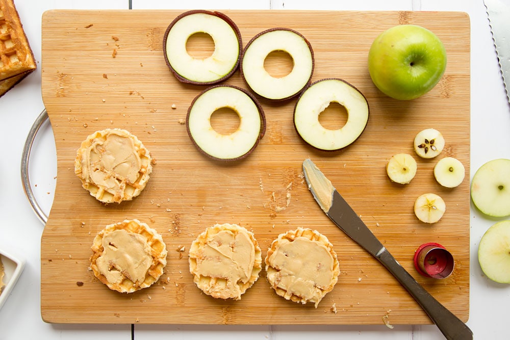 Adding peanut butter to the waffle buns