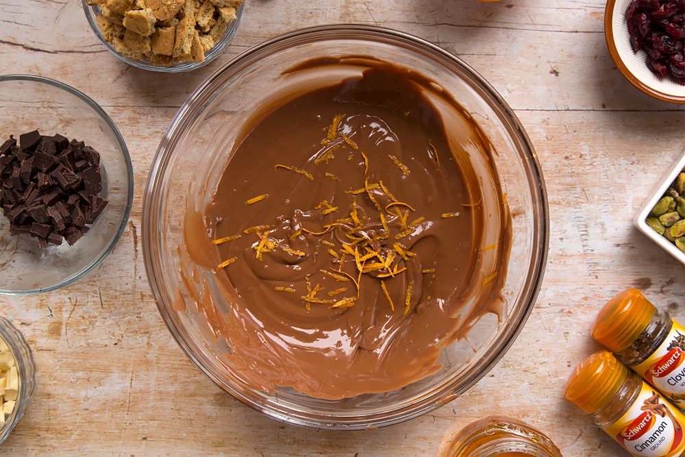 Step by step instructions to make Christmas spiced chocolate salami: add orange zest