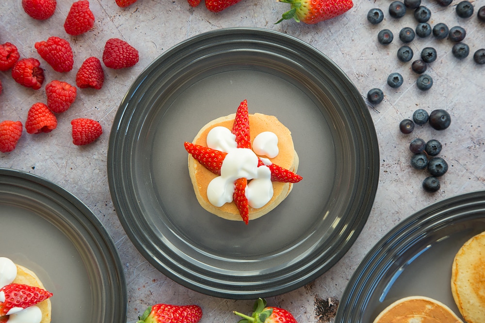 Add another pancake to your fruity pancake stack, this time topped with strawberries and yogurt