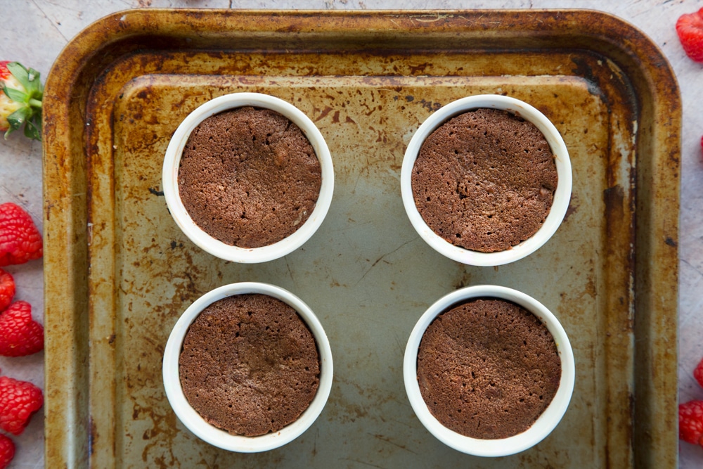 Freshly baked strawberry hot chocolate puddings