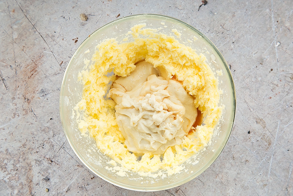 The two classic velvet frosting mixes are creamed together