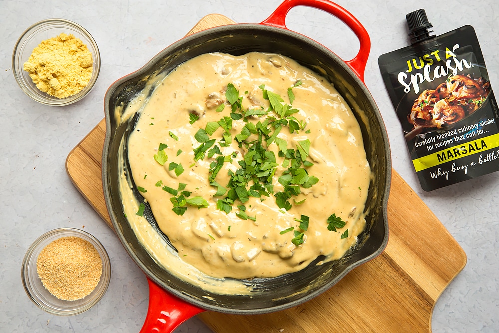 Parsley is added to the creamy marsala mushrooms
