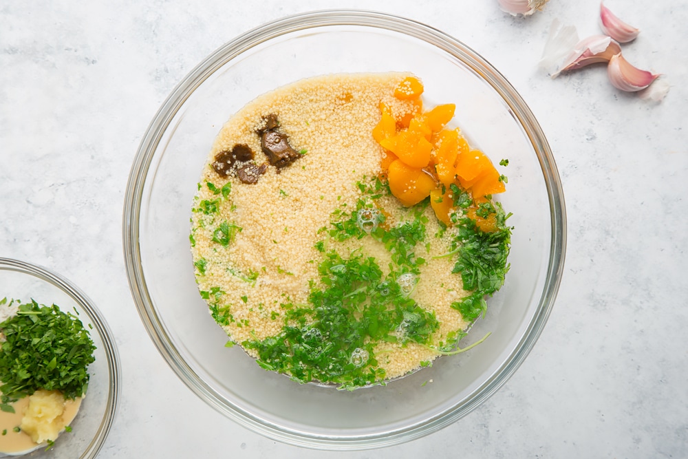 Adding boiling water to the herby couscous