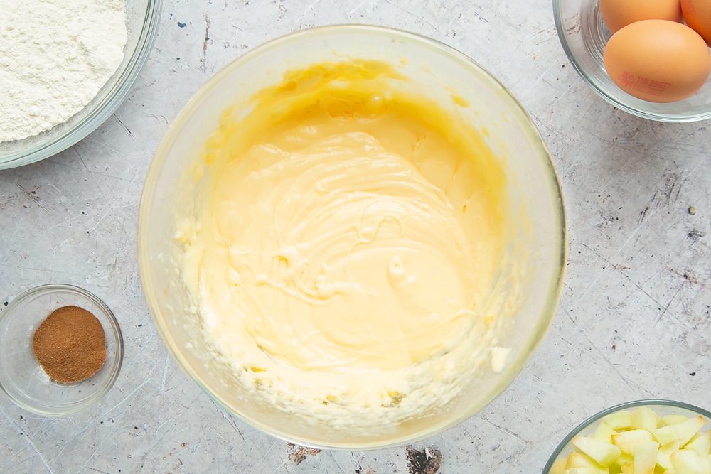 Preparing the apple, cinnamon and honey cake mix