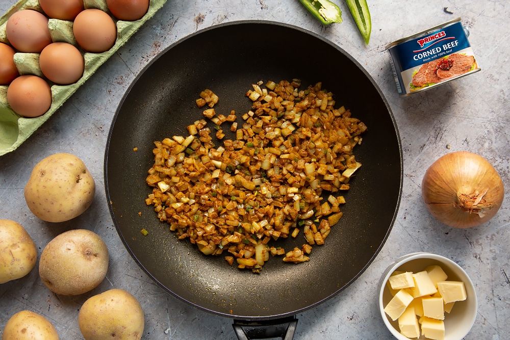 Browned ingredients in a frying pan