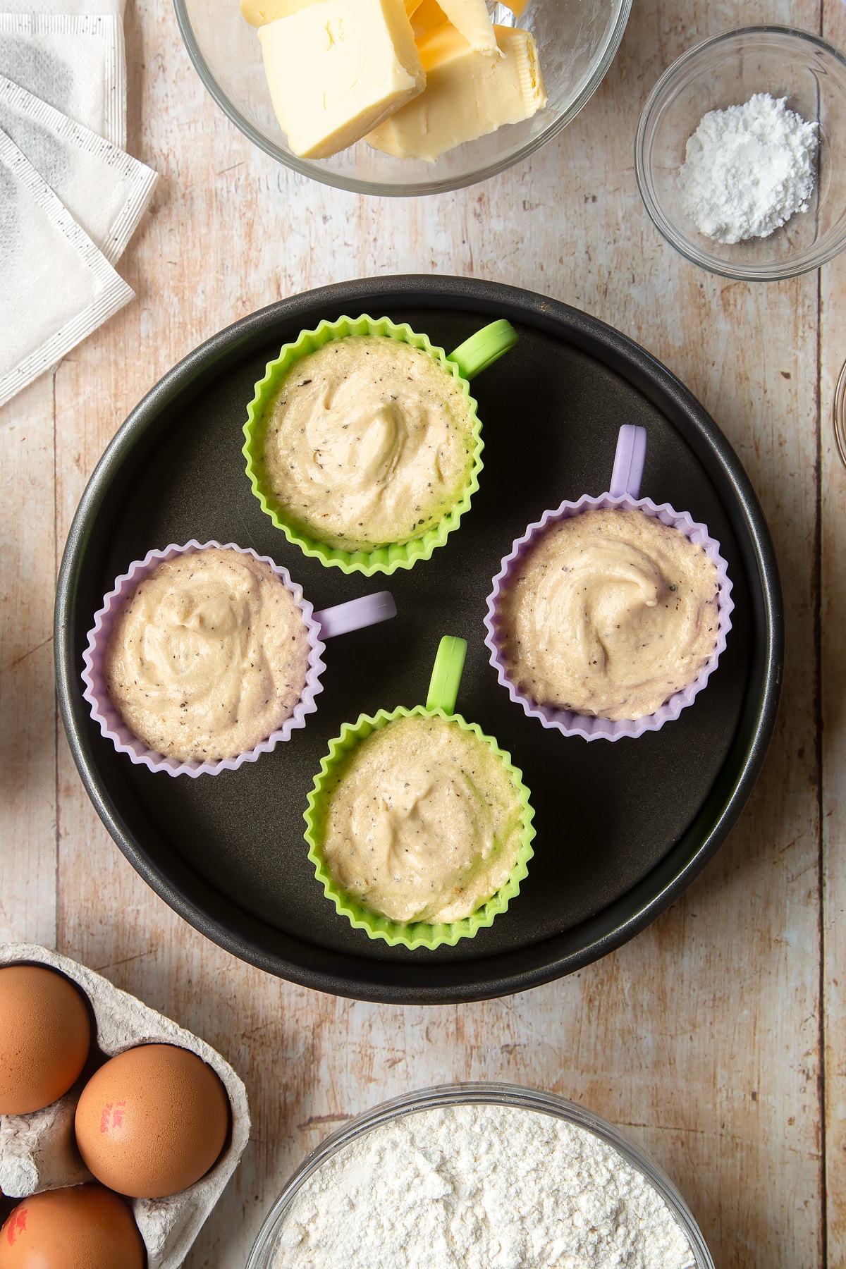 Overhead shot of Earl Grey cupcakes inside a silicone casing