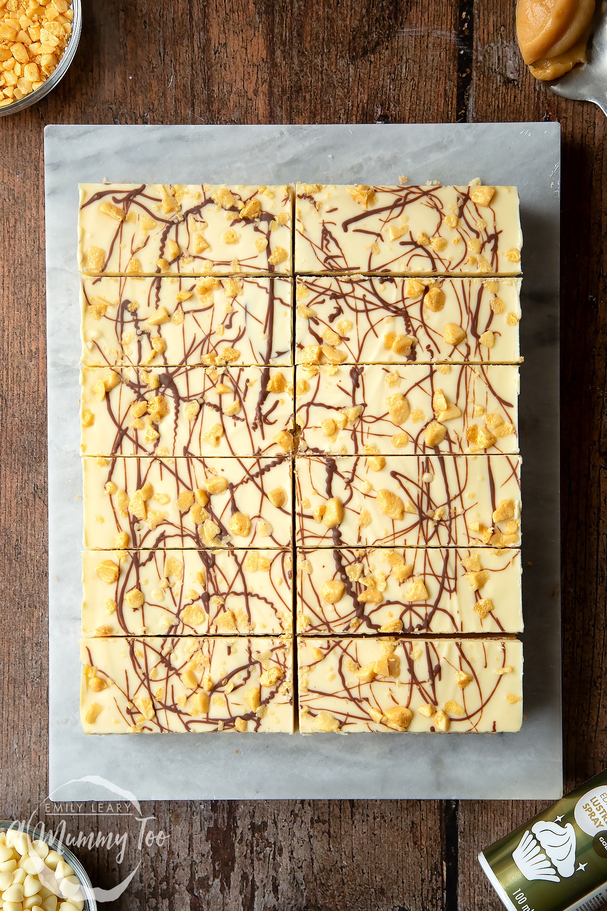 Overhead shot of the cake being split into sixteen bars evenly.