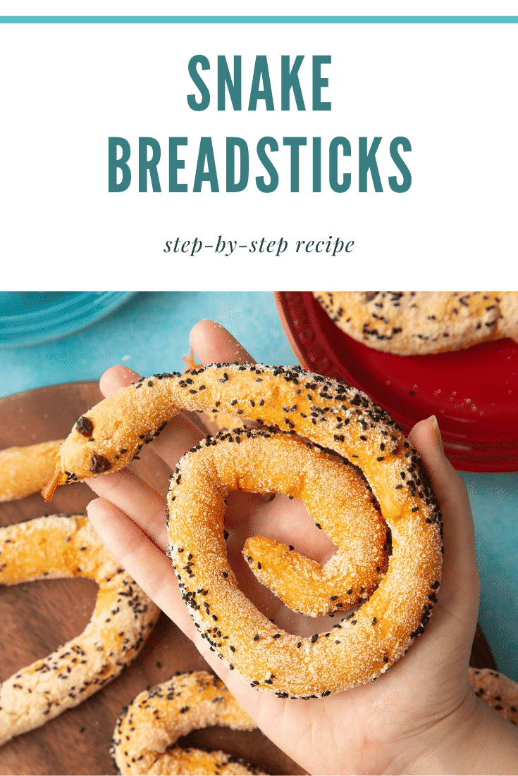A hand holds a coiled bread snake above more on a wooden board. Caption reads: snake breadsticks step-by-step recipe