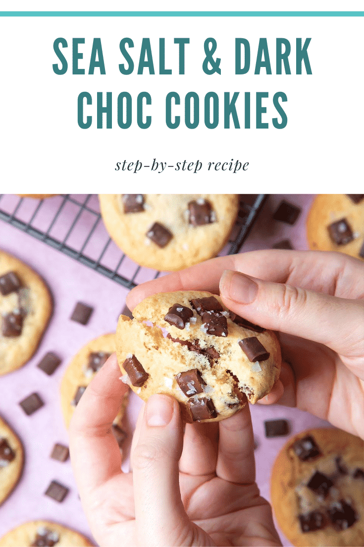 graphic text SEA SALT & DARK CHOC COOKIE step-by-step recipe above Overhead shot of a hand breaking sea salt choco cookies