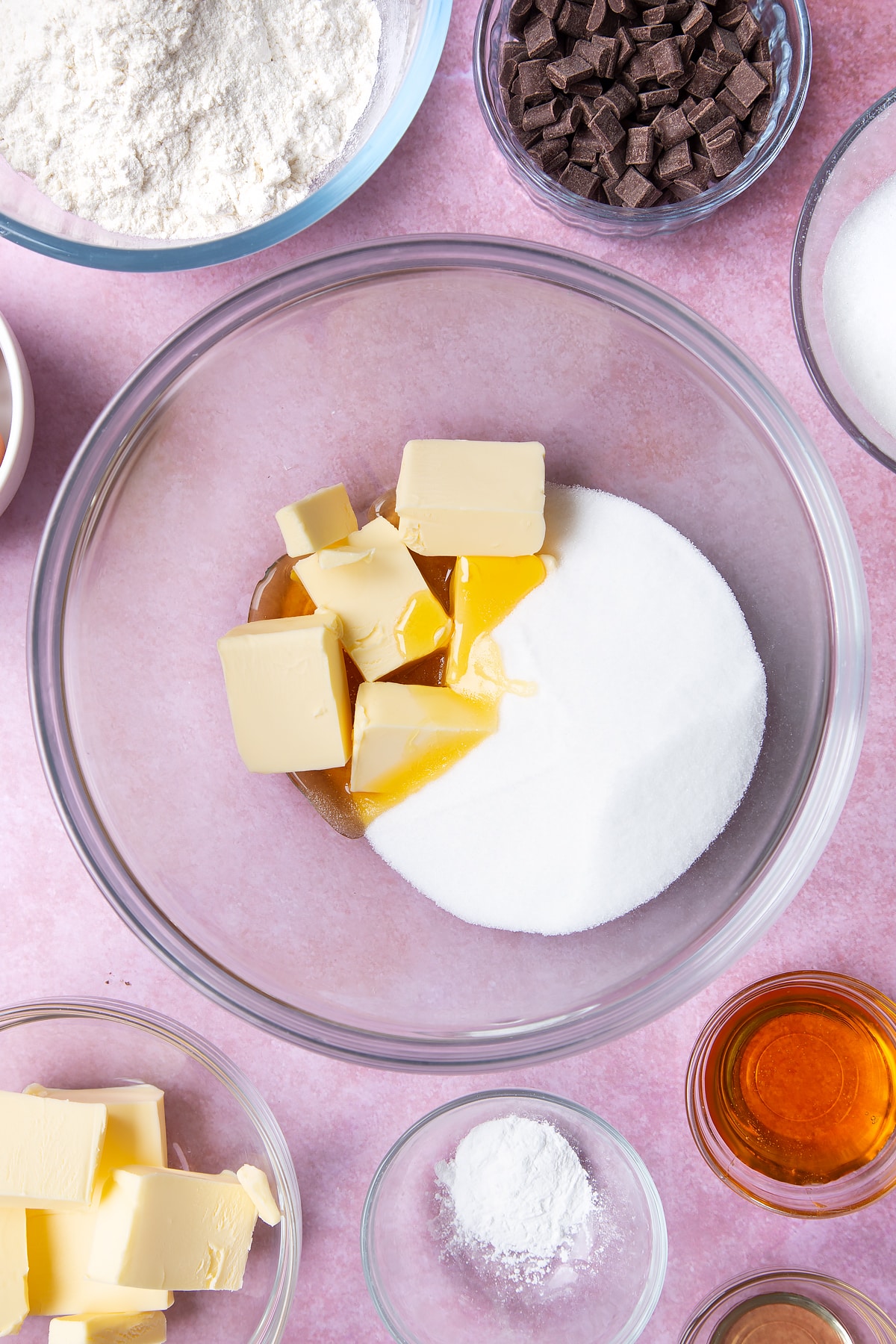 Overhead shot of butter, golden syrup, vanilla and sugar into a large bowl