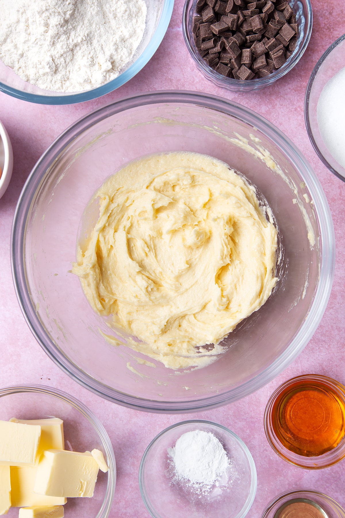 Overhead shot of butter in a large clear bowl