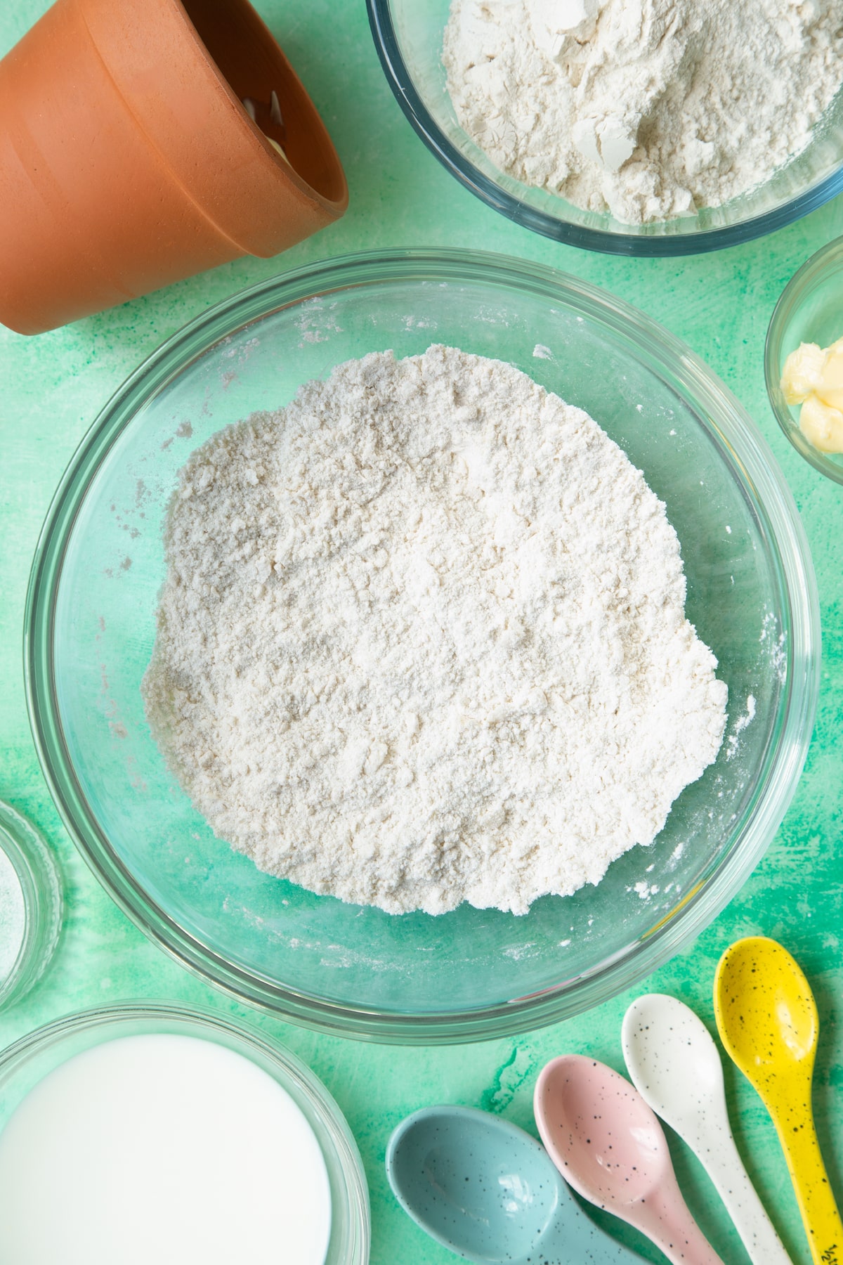Overhead shot of flour in a large bowl