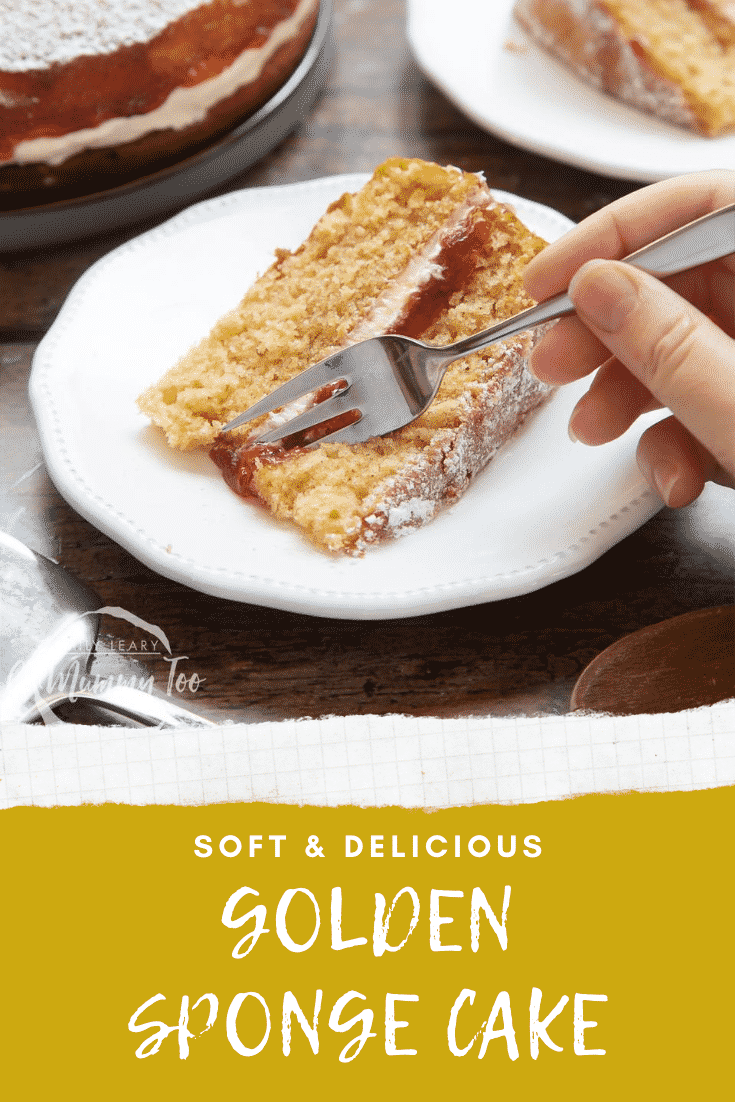 graphic text GOLDEN SPONGE CAKE above a golden sponge cake with jam and icing with a mummy too logo in the lower-left corner