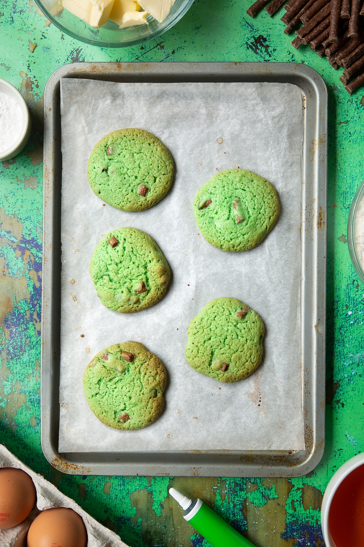 Matchmaker cookies on a lined baking tray.
