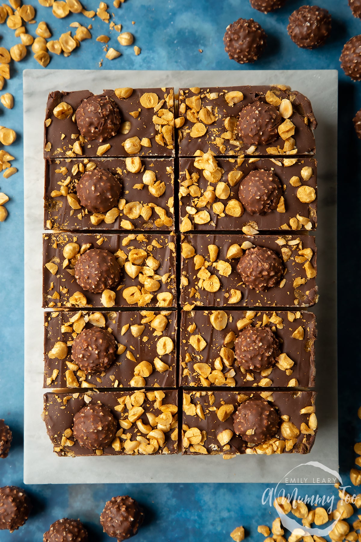 Marble board with freshly cut Ferrero Rocher slices.
