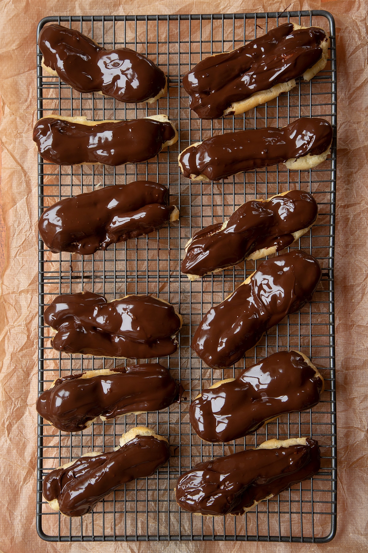 Melted chocolate coated on the top of the choux pastry.