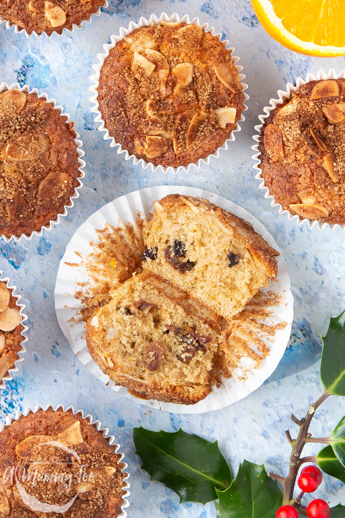 Overhead shot of a orange and cinnamon muffin cut in half and opened up