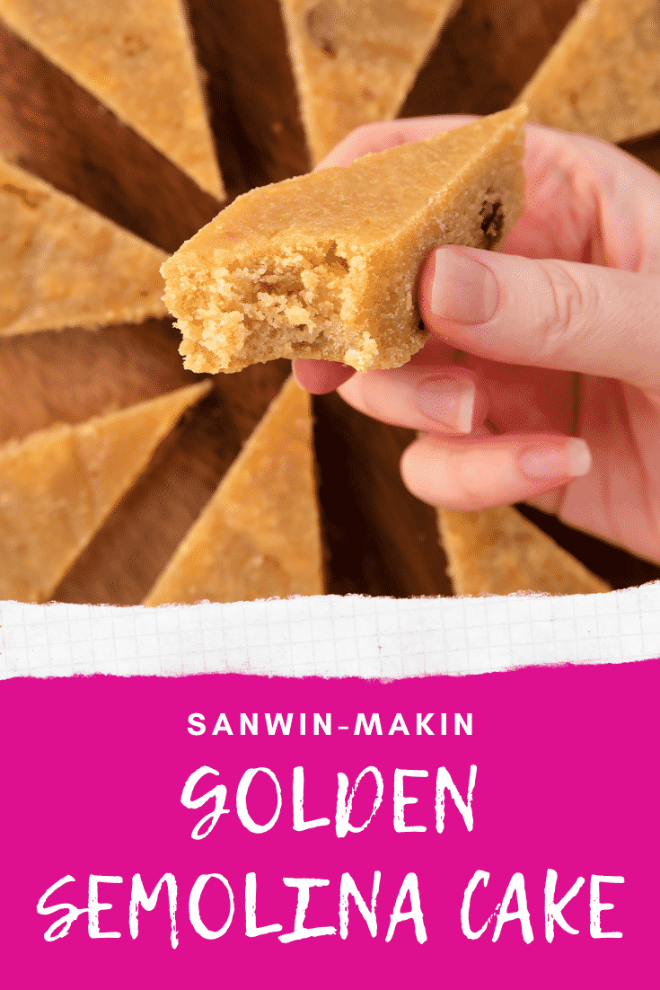 Hand holding a piece of sanwin-makin with a bite out of it. More is shown on a wooden board. Caption reads: Sanwin-makin golden semolina cake